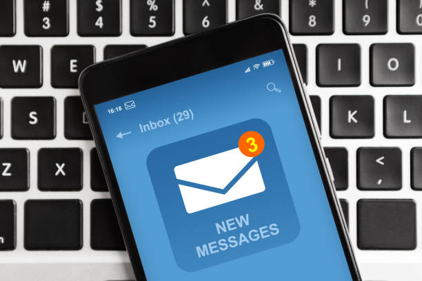 Man using chat message app on smartphone, in response to communication