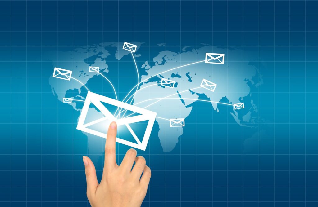 BSG Bulk SMS_Hands with world mail delivery on world map background
