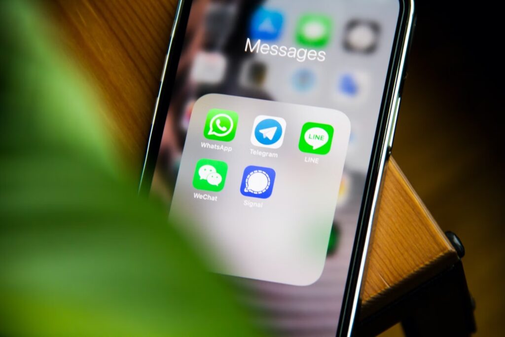 SMS marketing for B2B sales: business team using text messaging to reach clients